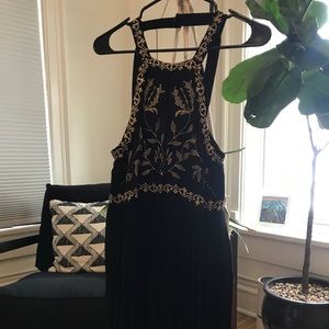 Black and gold mini dress